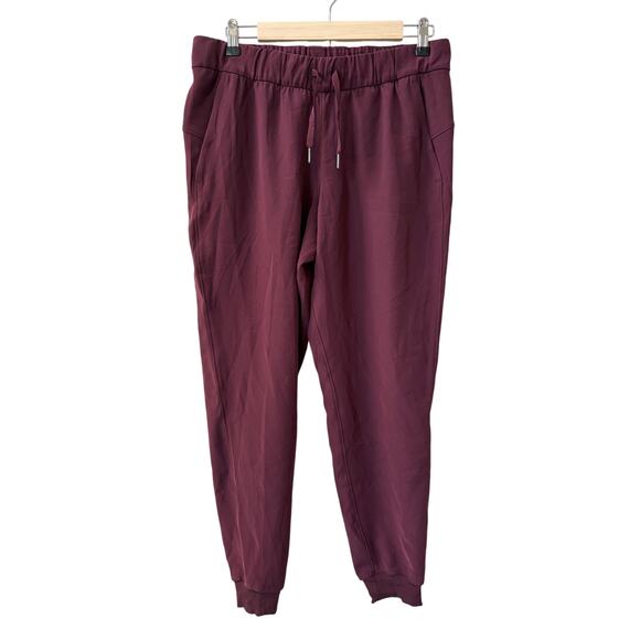 Lululemon Sz 8 On The Fly Jogger Dark Adobe Red Maroon Burgundy Athletic‎ Pant - Picture 1 of 8